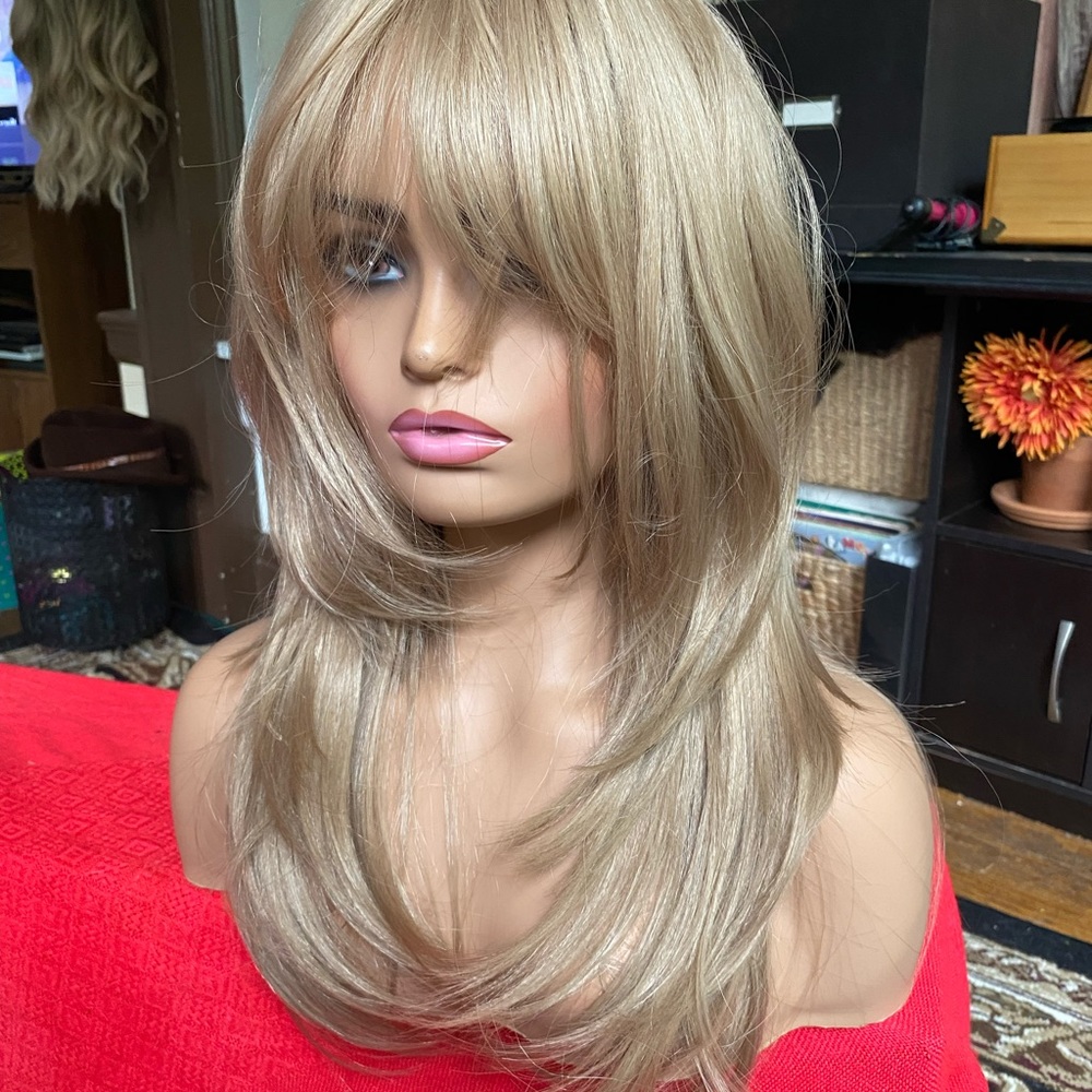 - fawn blonde layered ultra real wig